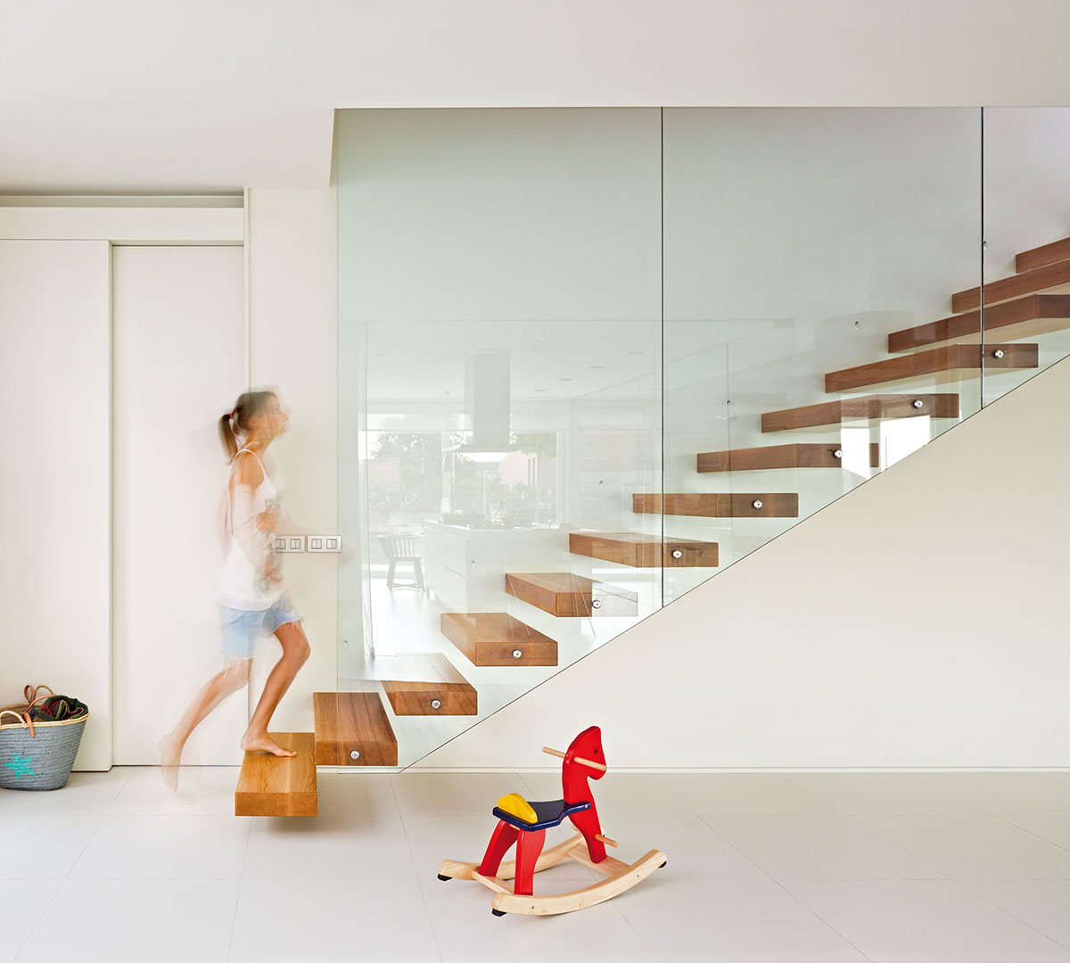  Cerrada con un paño de cristal escaleras