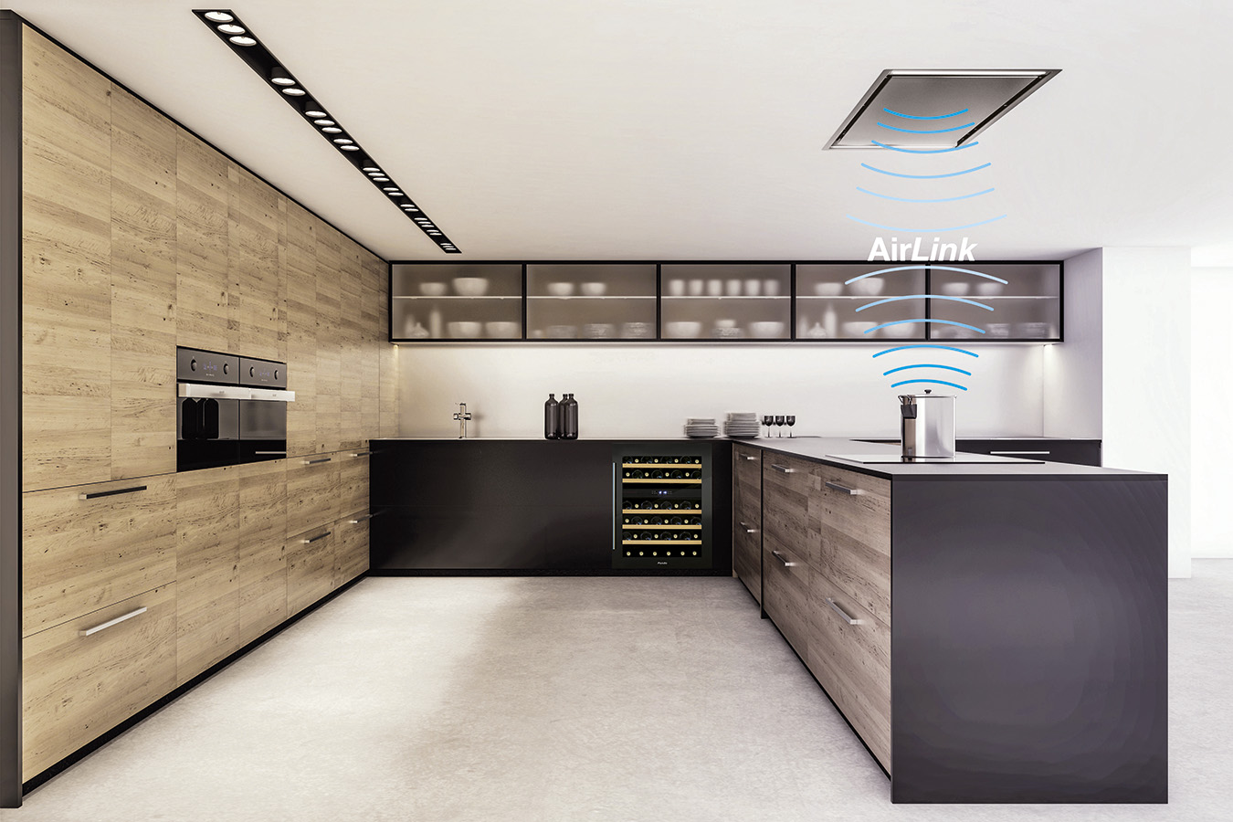E-297 AirLink y vinoteca. AirLink by Pando es un sistema de control inteligente de funcionamiento combinado entre la campana y la placa de inducción. La campana se ilumina automáticamente al encenderse la placa, su motor se pone en marcha al iniciar el ciclo de cocción de cualquier inductor y aumenta y disminuye la potencia en función de la exigencia de potencia que se ordene a la placa.