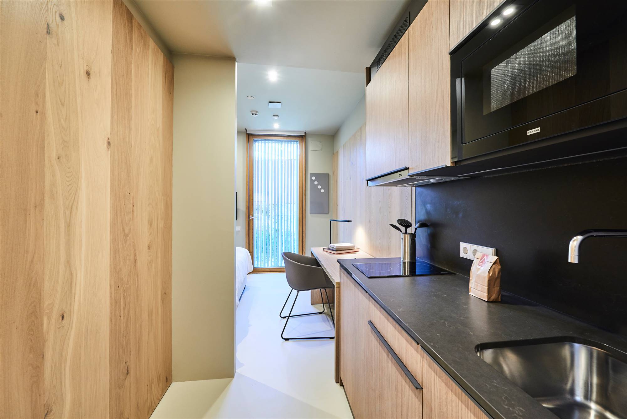La madera es la protagonista en los interiores de Tarruella Trenchs Studio.