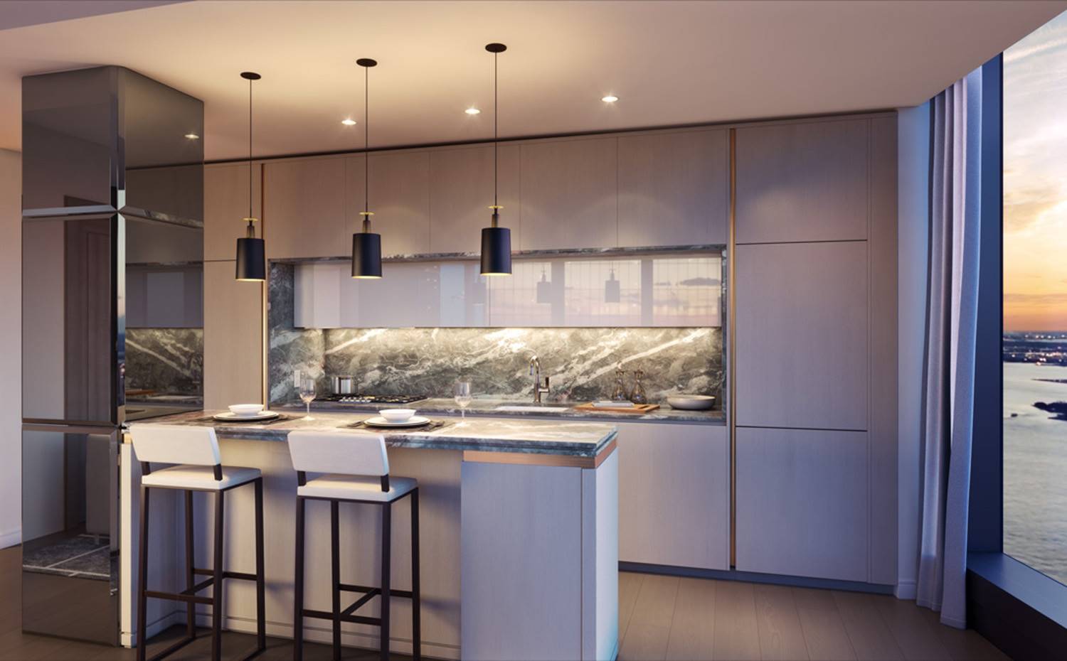 Cocina con office, taburetes blancos, columnna recubierta de espejos, lámparas de suspensión. La cocina está equipads con carpintería a medida, electrodomésticos Miele y encimeras y frentes de mármol diseñados para adaptarse a la paleta cromática correspondiente.