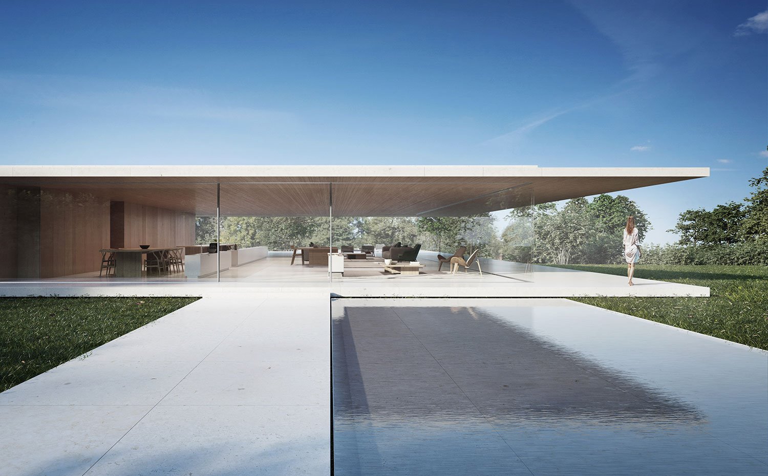 Pasarela de entrada con base cubierta de agua y cesped alrededor de la plataforma donde se levanta la vivienda, interior zona de día