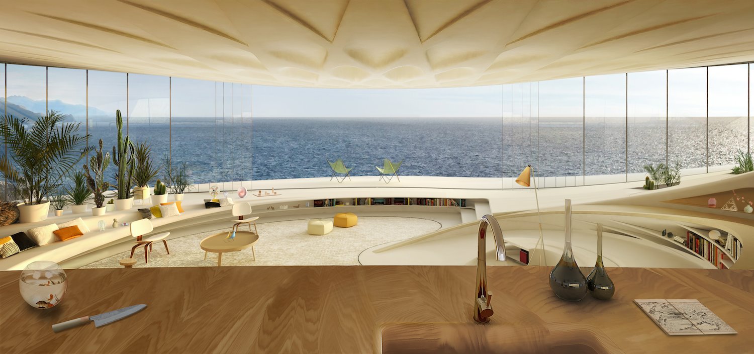 Vista de la cocina de la casa creada por David Ajchman.  Toda la zona de cocina se orienta hacia el mar, lo que permite estar cocinando y disfrutar en todo momento de las panorámicas que regala el paradisíaco entorno.