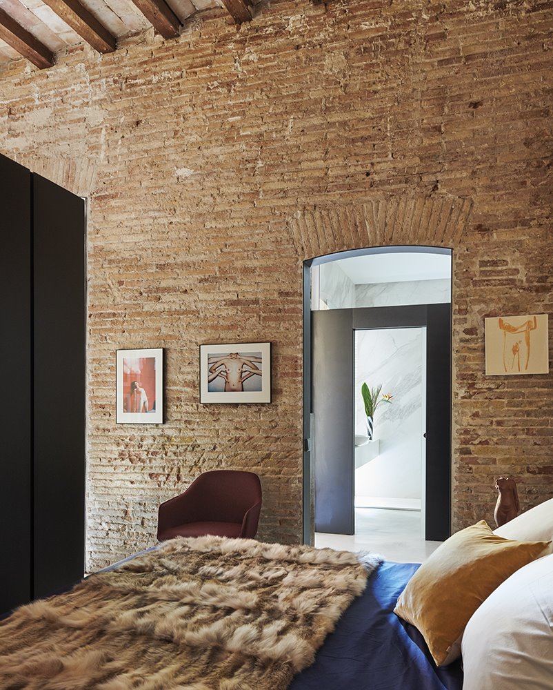 casa rardo architects dormitorio pared de ladrillo
