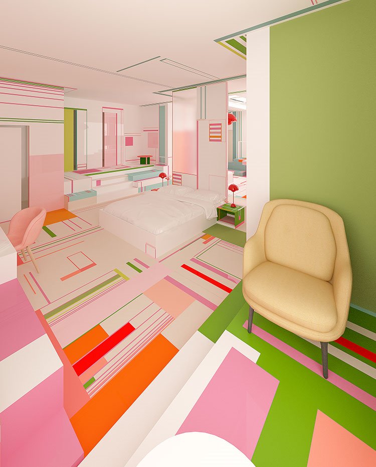Rincón de lectura con butaca en beige y suelo en geometrías de colores