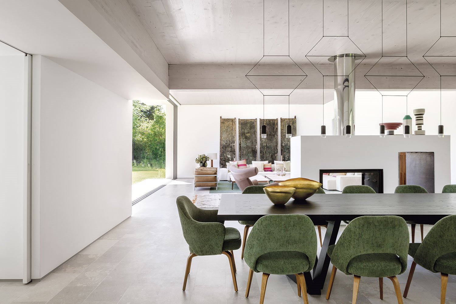 comedor-casa-abaton-butacas-verdes