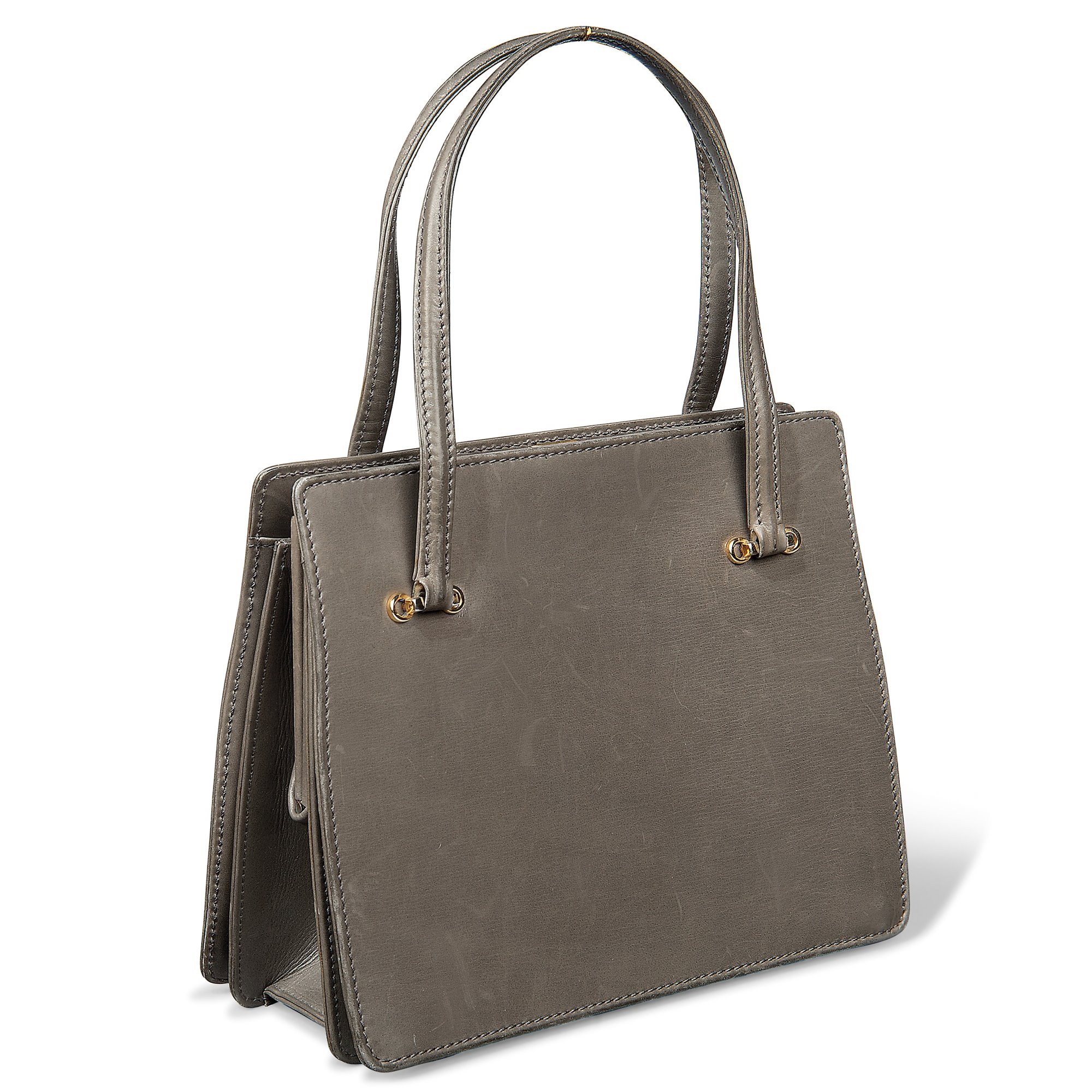 Asprey Handbag owned by Margaret Thatcher, Early 1980s, Britain. Image courtesy of Museum of Bags Amsterdam. De Margaret Thatcher
