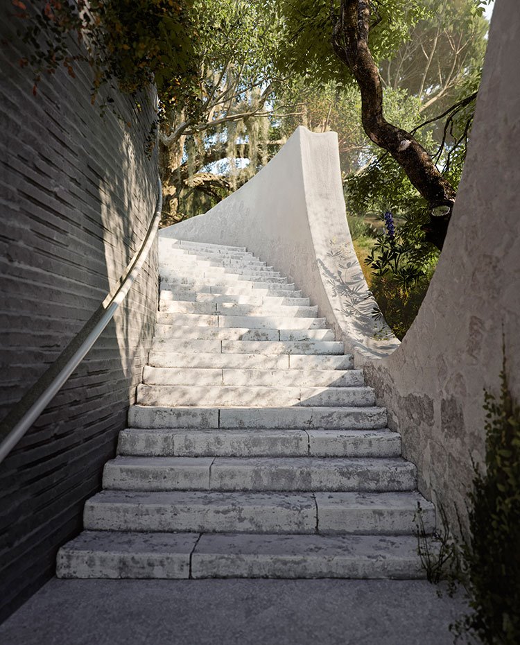 Escaleras de piedra vordeando la estructura de la vivienda de líneas curvas, murete con motivos convexo