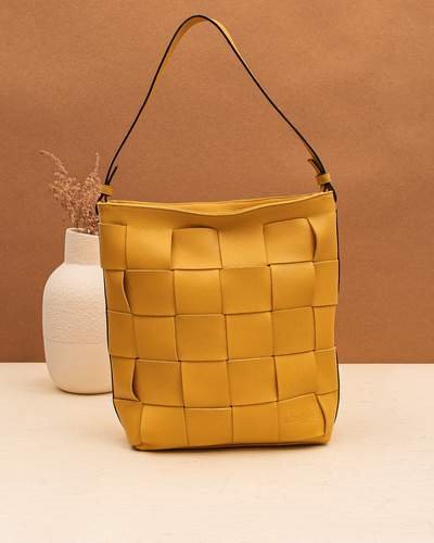 Bolso color mostaza y forro en algodón Simona Golden, de Möhel.