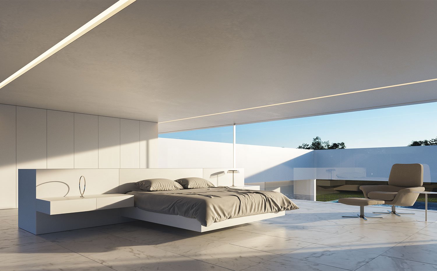 Dormitorio amplio y luminoso con carpintería en madera clara y butaca y ropa de cama en tonos piedra