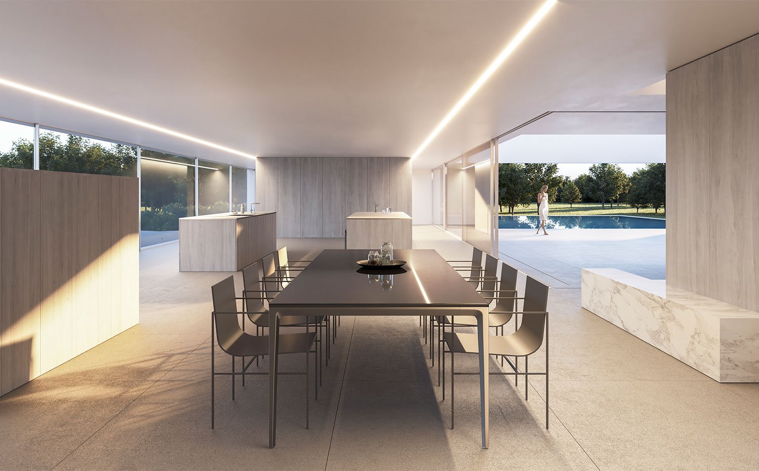 Mesa de comedor junto a cocina en isla, con mobiliario en acabado madera y mármol