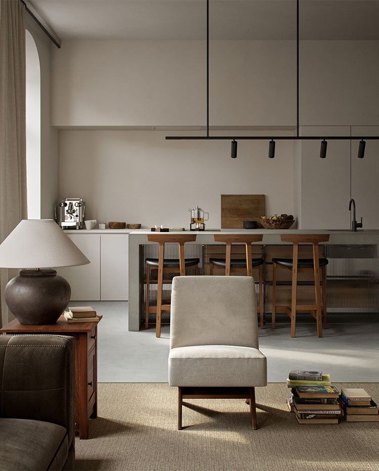 Salón hacia cocina con butaca en crudo, sofá en gris