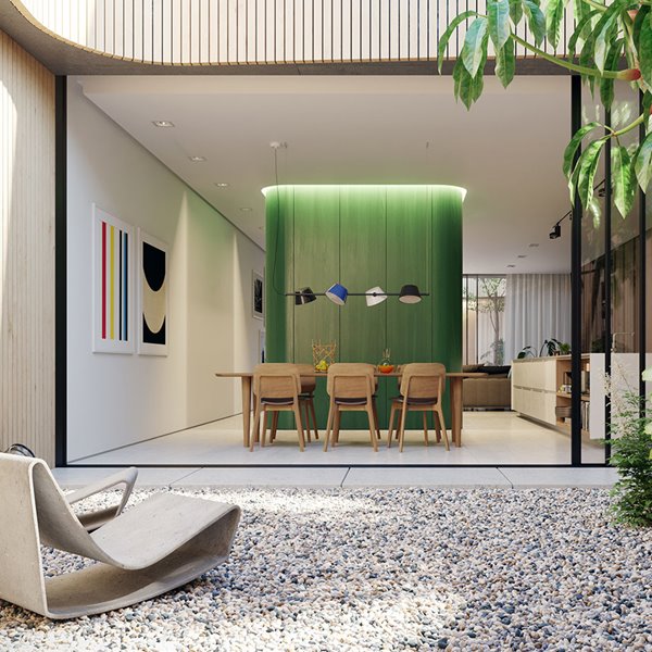 Patio-junto-a-comedor-y-cocina-abierta-y-mueble-separador-de-ambientes-en-verde
