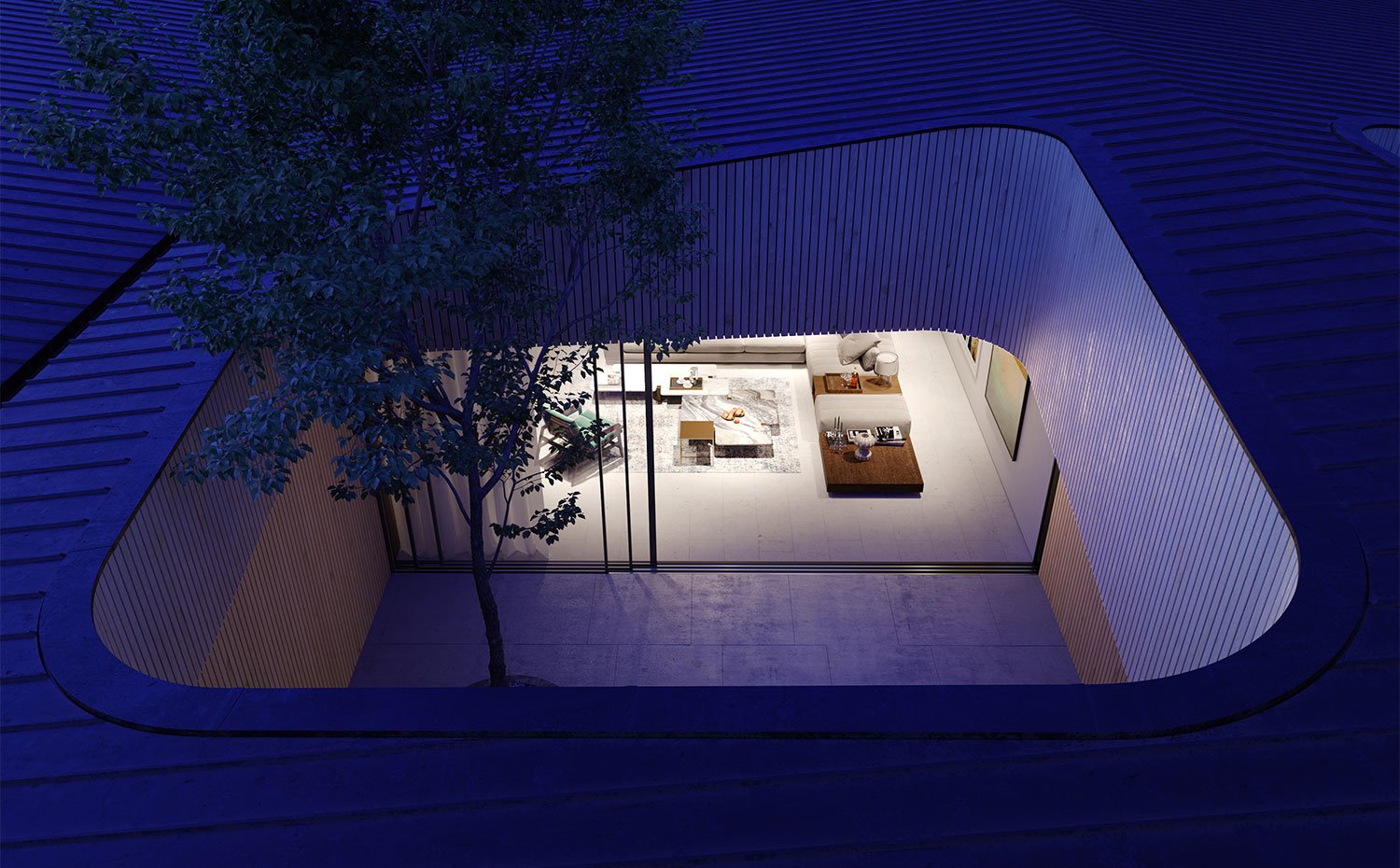 Vista-cenital-del-patio-interior-de-la-vivienda-con-árbol-sobresaliendo