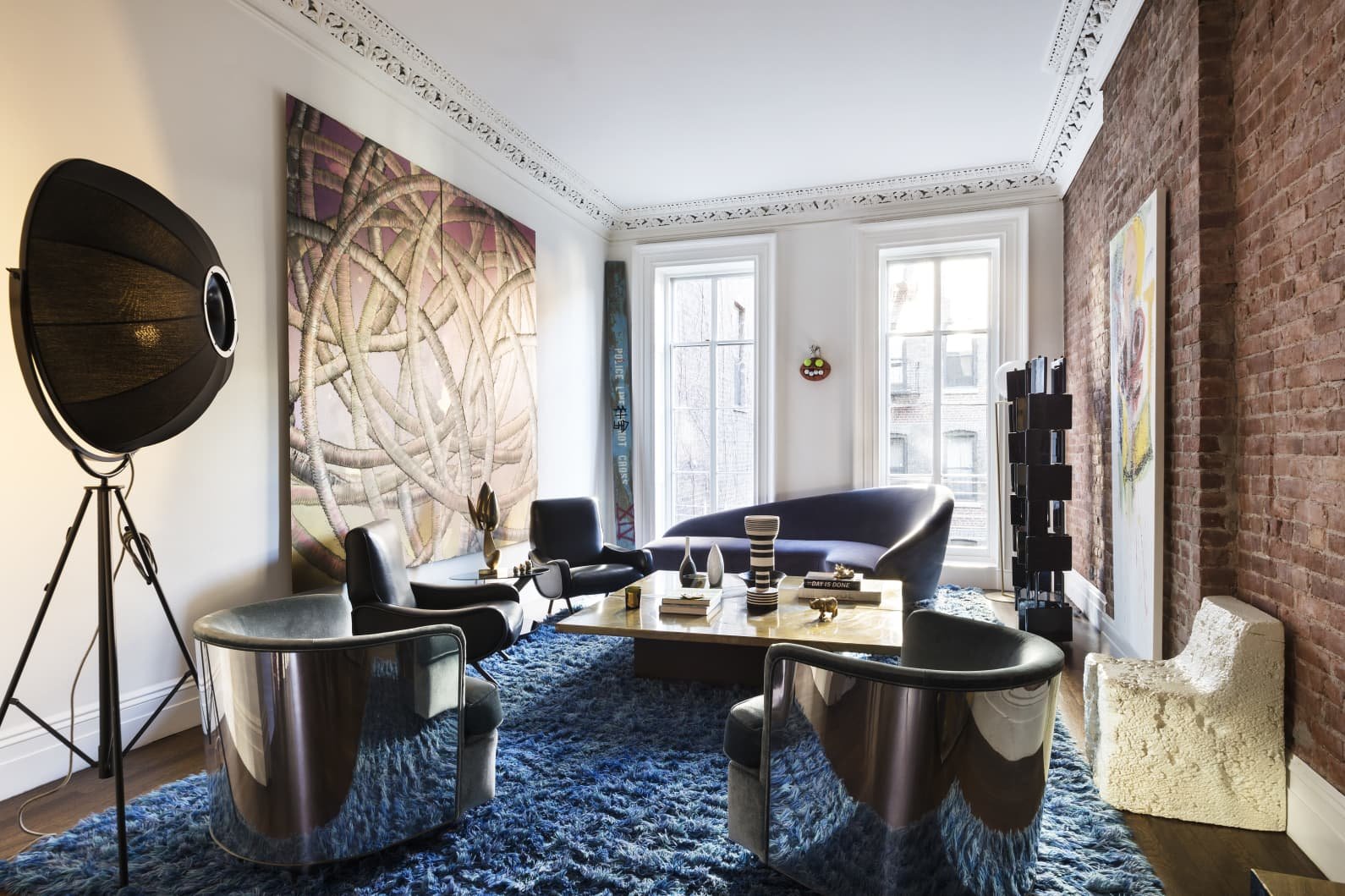 Apartamento Mary Kate Oslen en Manhattan estar con lampara de Fortuny