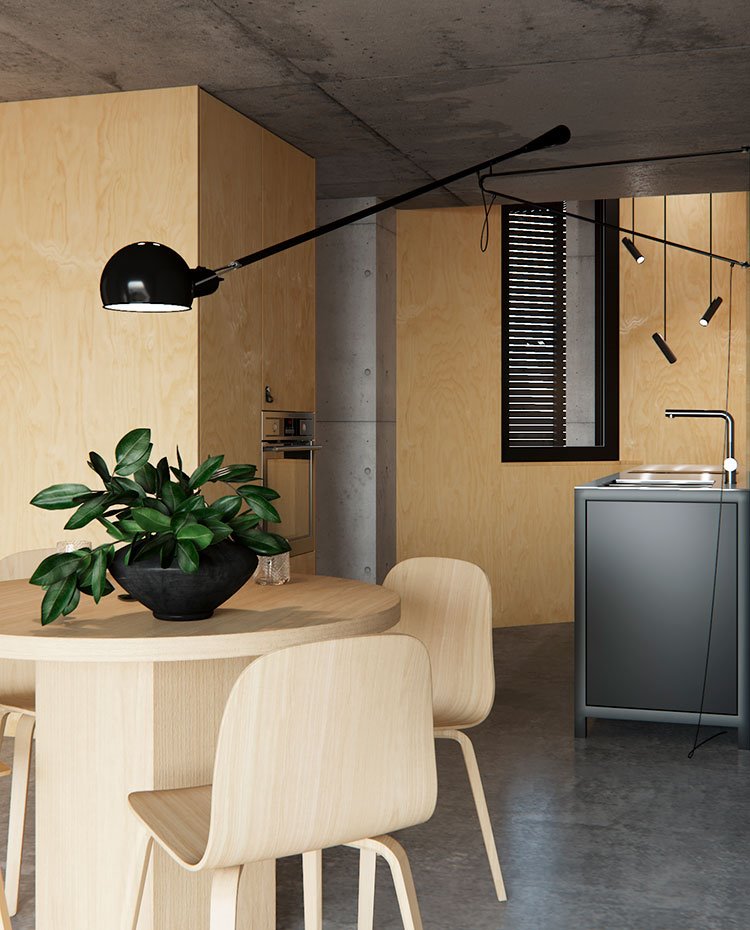 Cocina con módulo de fregadero en gris y columna de almacenaje en madera, y comedor con mesa y sillas de madera