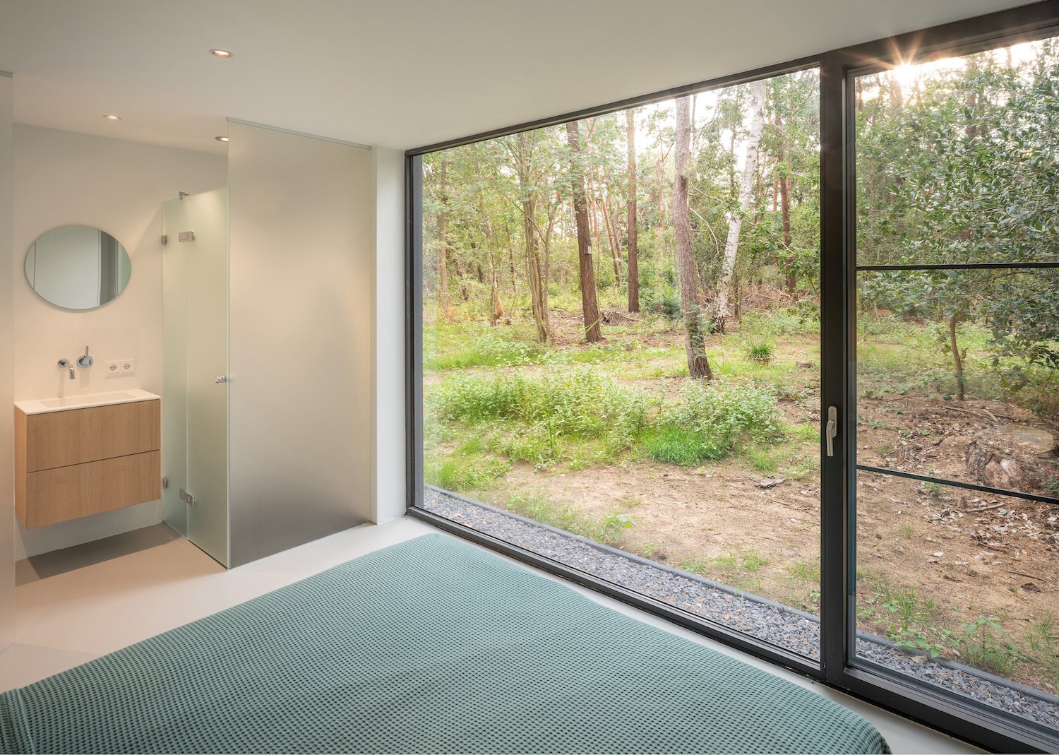 Dormitorio con vistas al bosque