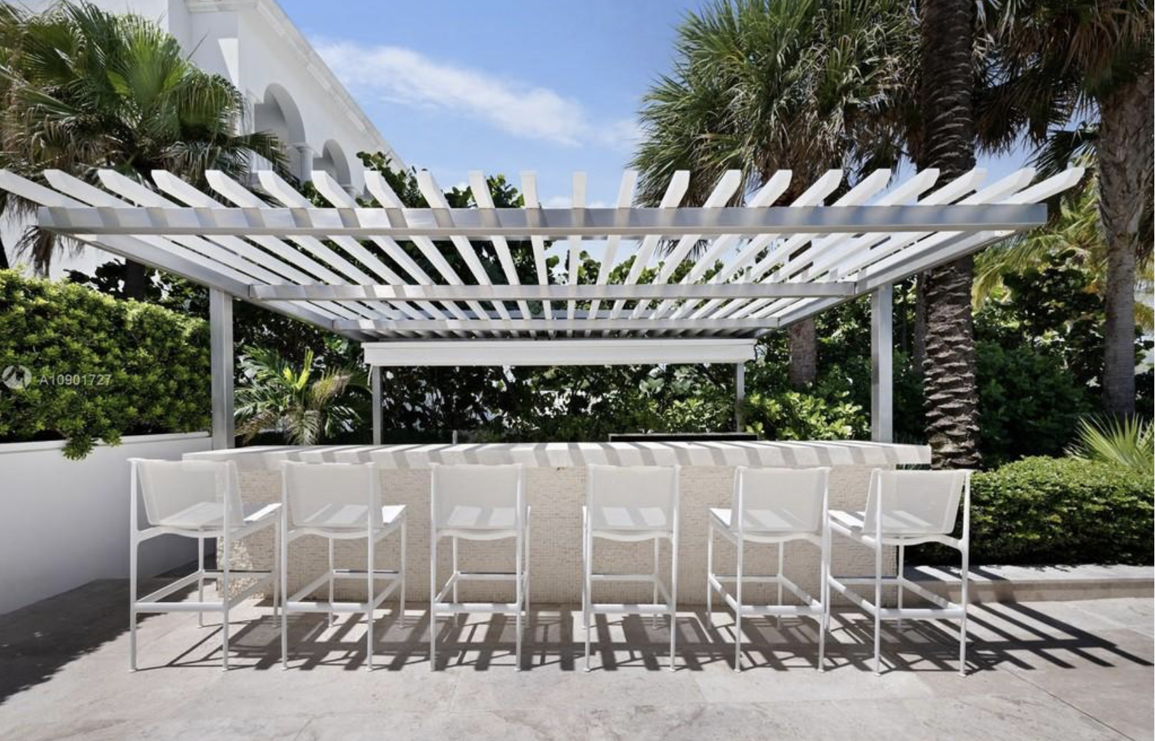 Casa Tommy Hilfiger pergola jardin exterior