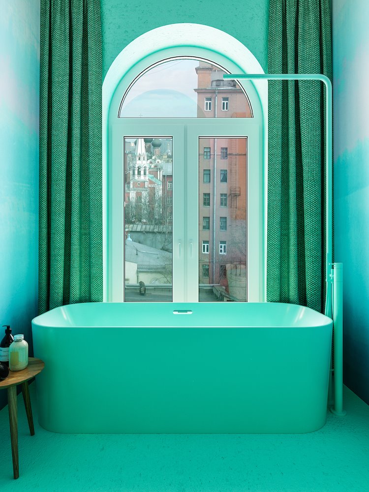 Bañera de color verde junto a una ventana