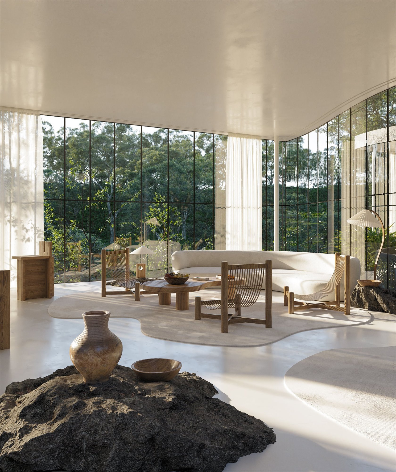 salon de una casa moderna en mitad del campo con paredes de cristal