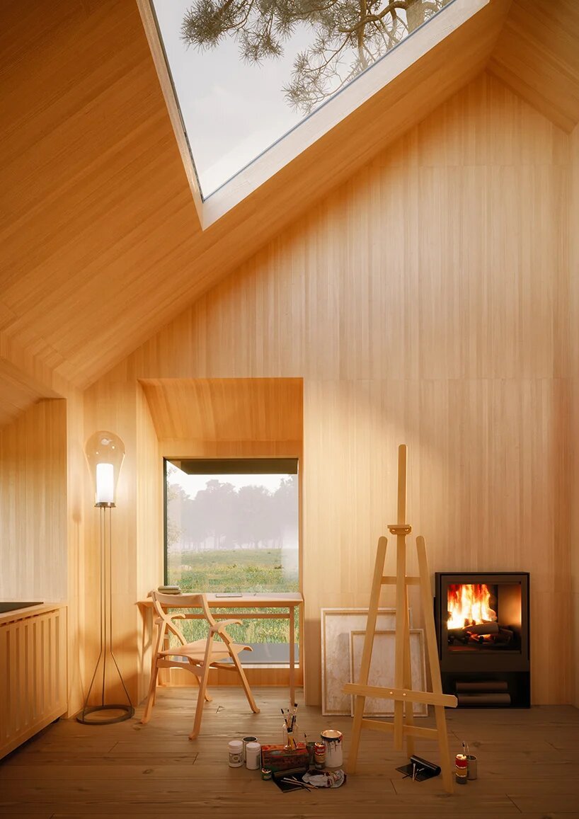 Casa prefabricada para estudiantes diseñada por AMDL circle y Michele de Lucchi interior de madera con estufa