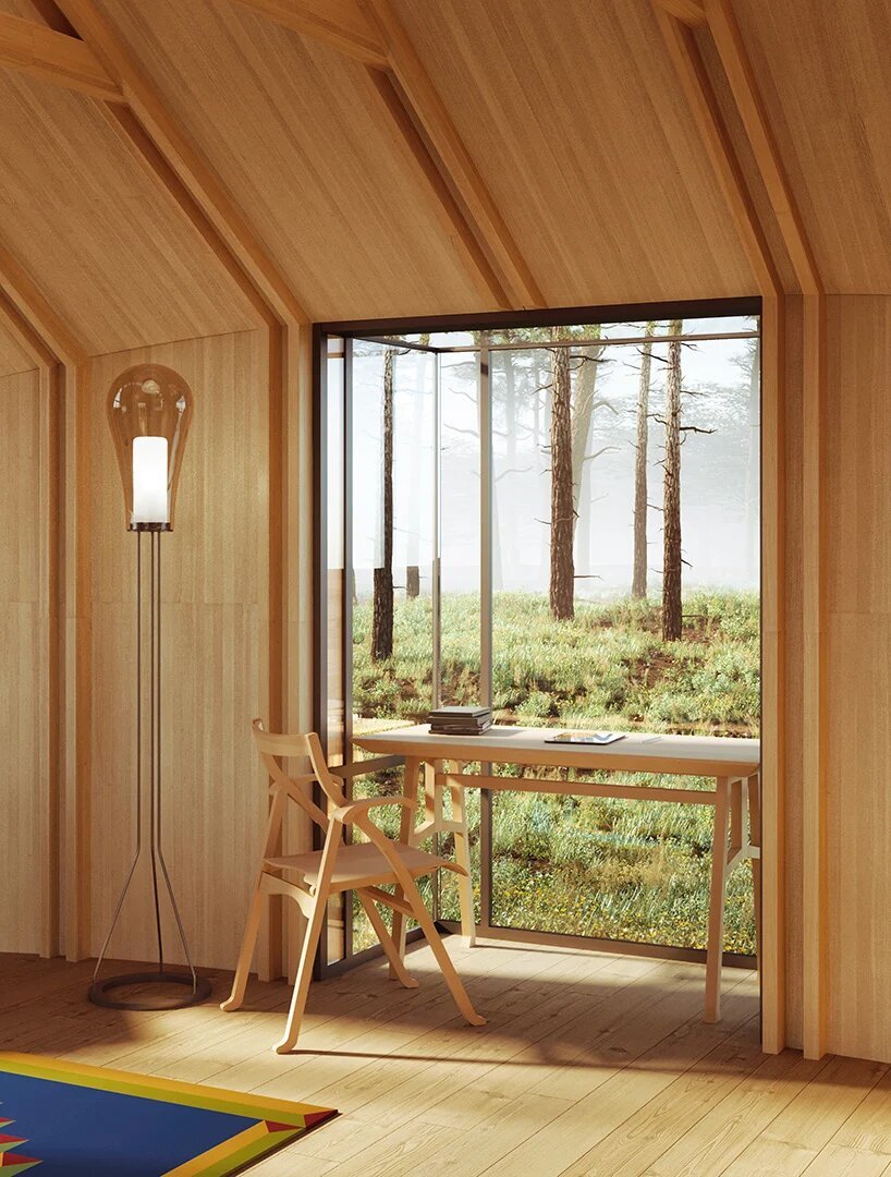 Casa prefabricada para estudiantes diseñada por AMDL circle y Michele de Lucchi vista desde una ventana