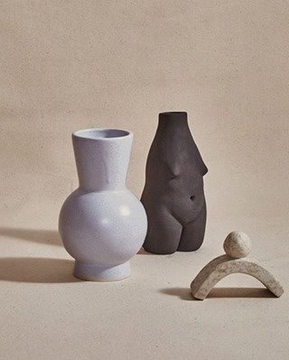 Jarrones de ceramica en forma de busto femenino