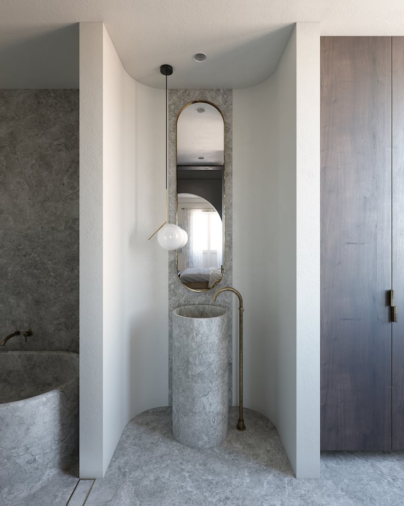 Baño con lavamanos de color gris