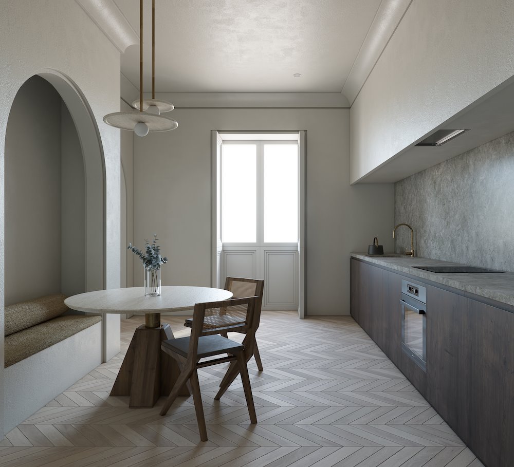 Cocina con mesa redonda y sillas de rejilla de una casa moderna