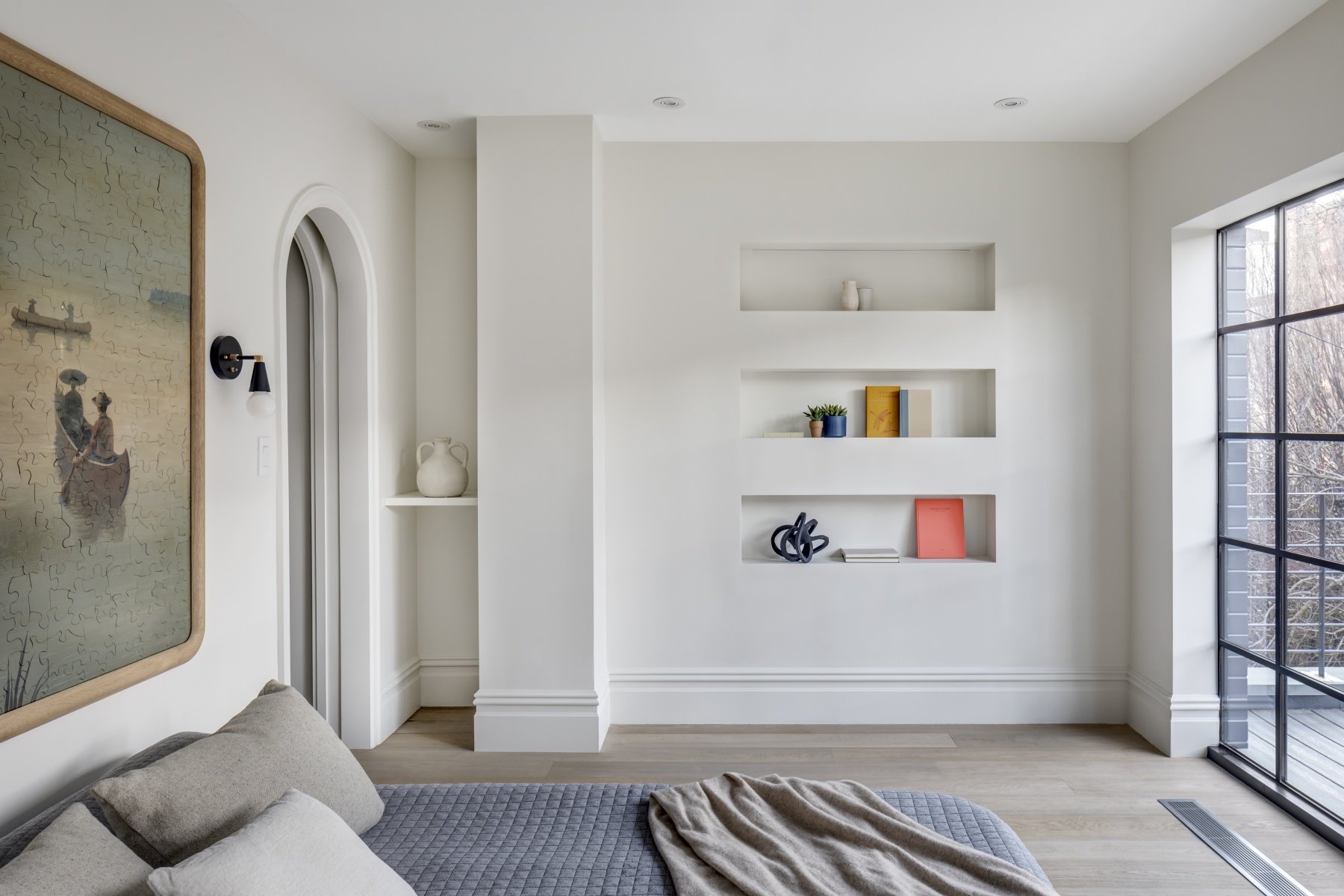 dormitorio-con-pared-de-obra-de-un-piso-en-nueva-york 78665ca4 640x427