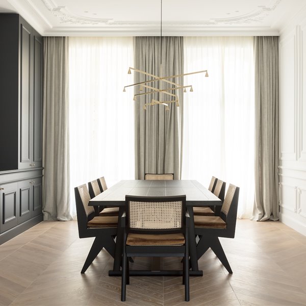 Casa en Bruselas con interiores modernos comedor con molduras