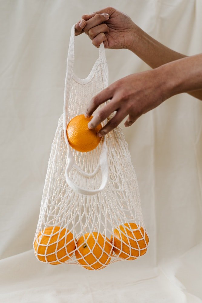 Bolsa de algodon con naranjas. Encuentra opciones reutilizables
