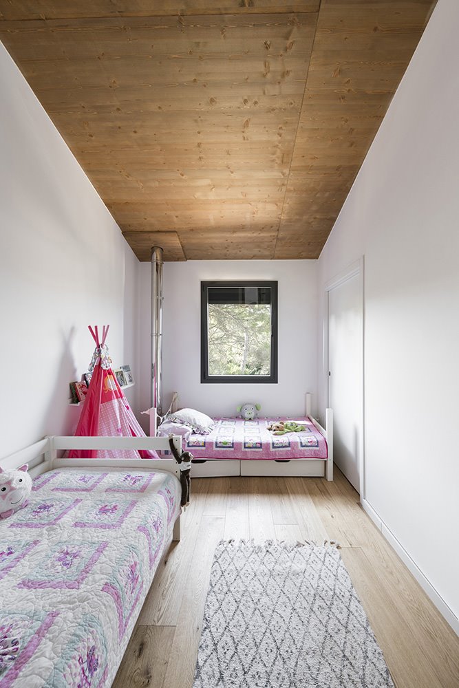 casa pasiva roots bud arquitectura dormitorio