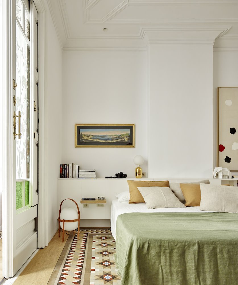 Dormitorio con suelo hidraulico
