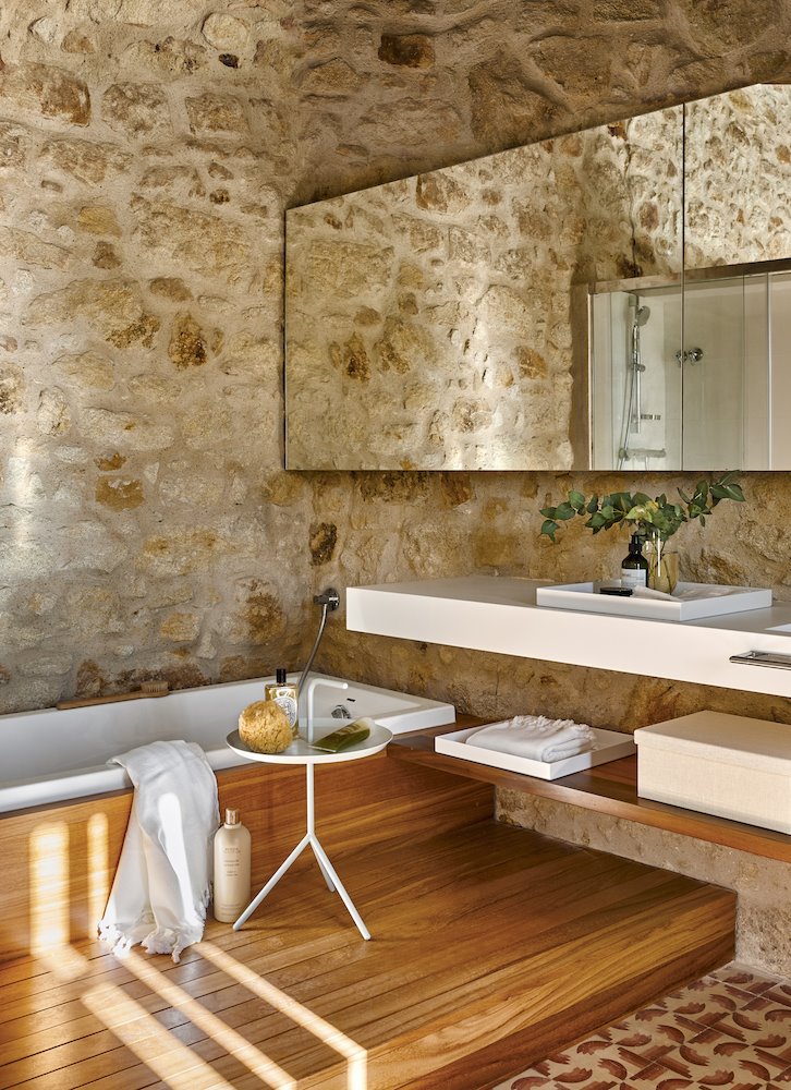 Casa moderna estilo rústico baño de piedra