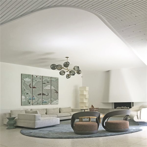 La arquitectura de Oscar Niemeyer inspira esta moderna casa con fachadas blancas en Australia