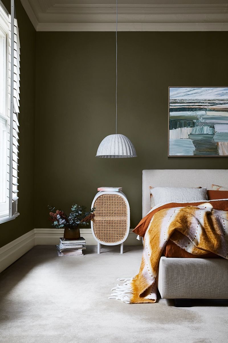 Bedroom with green mesh bedside table.  inseparable companion