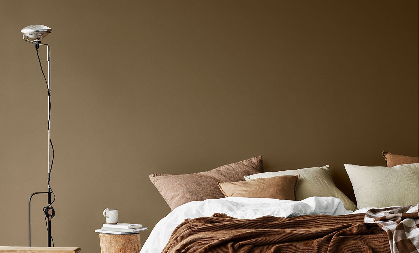Bedroom in tan beige and brown.  contrast of opinions