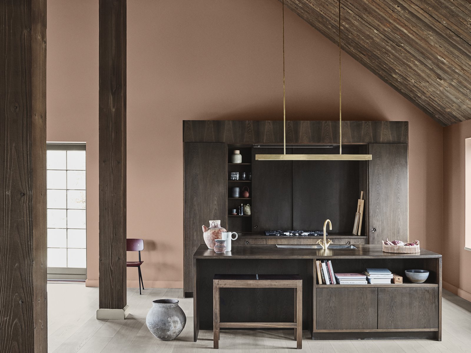 Kitchen with brown walls and wooden furniture.  the color of spirituality