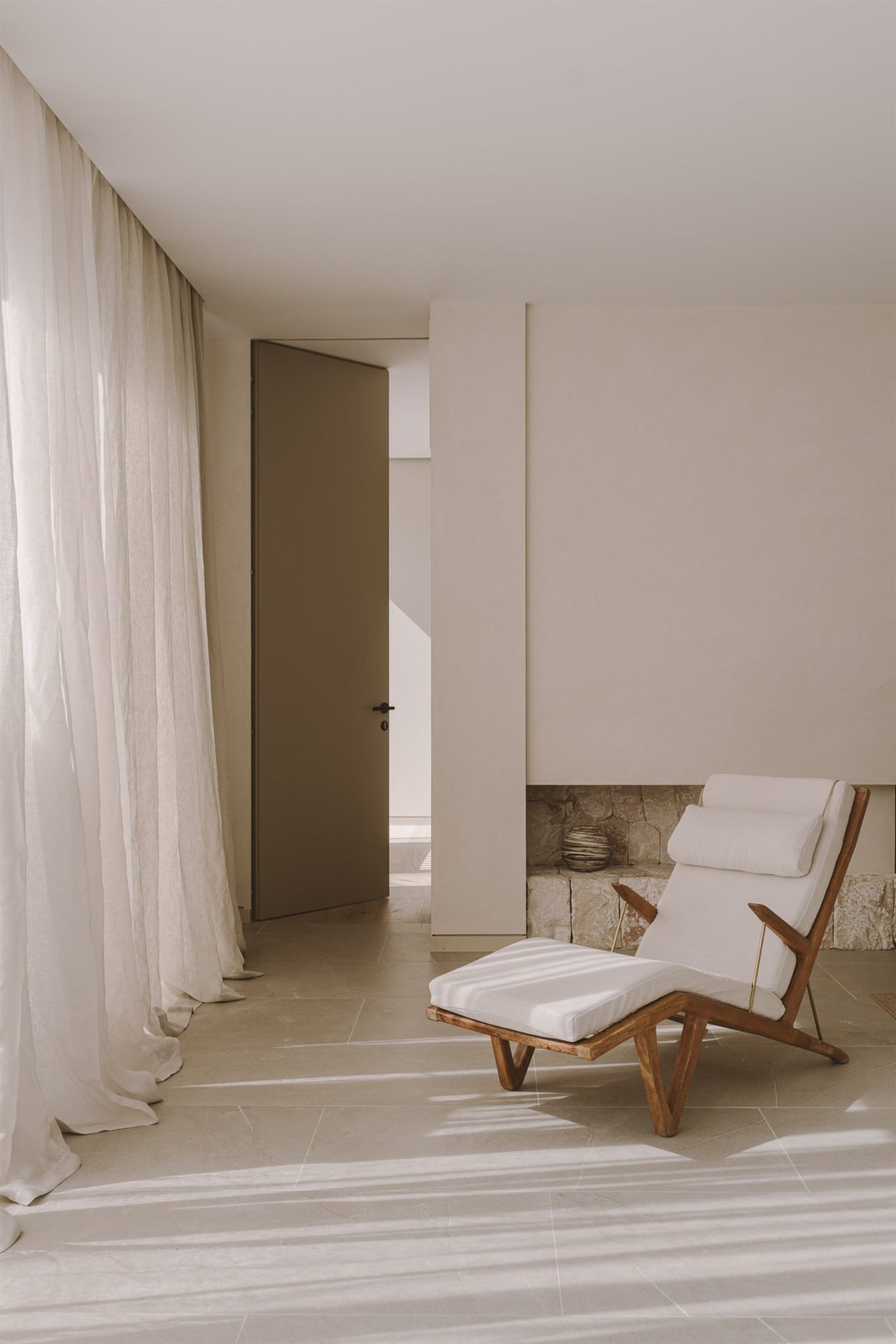 casa en Mallorca tumbona cortinas