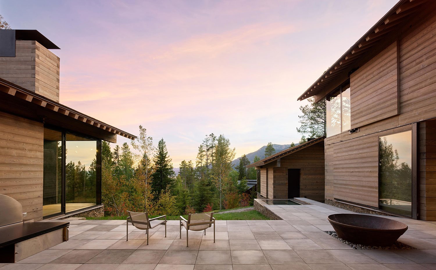 terraza-exterior-entre-estructura-de-vivienda-en-madera-y-piedra 9864515d 1500x930