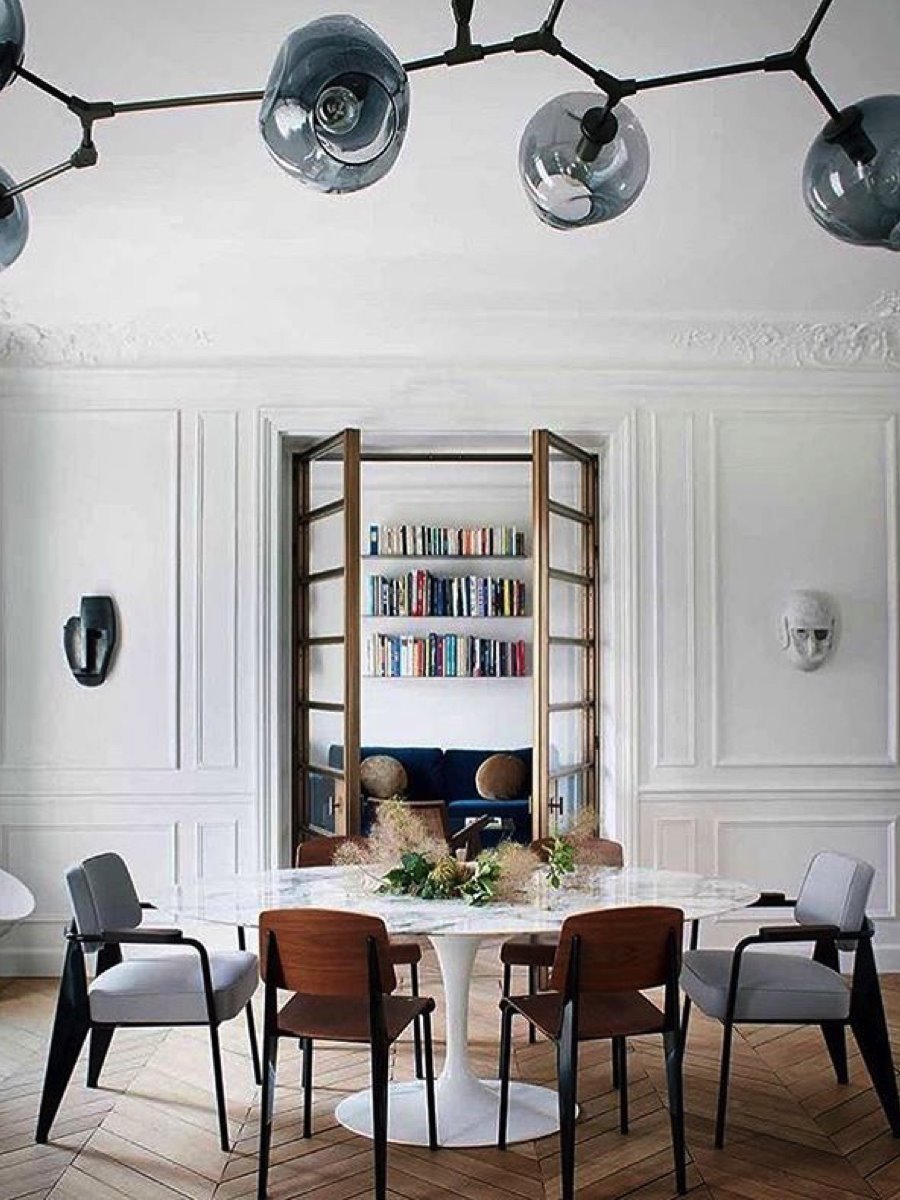 mesa-y-sillas-tulip-de-eero-saarinen-para-knoll 