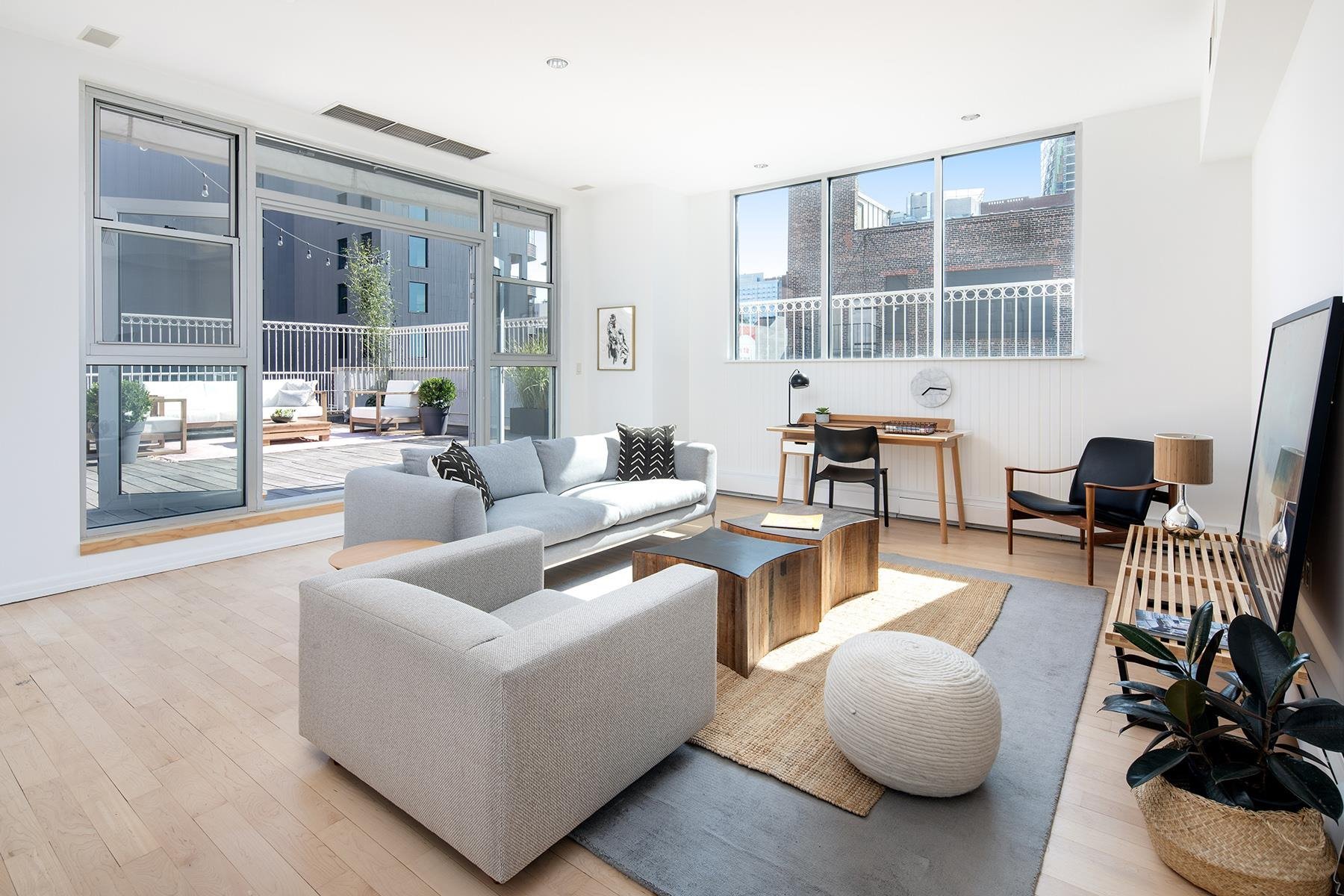 estar-con-television-y-vistas-a-la-terraza-del-apartamento-atico-de-kate-winslet-en-nueva-yorkjpg 8e65bc14 1800x1200