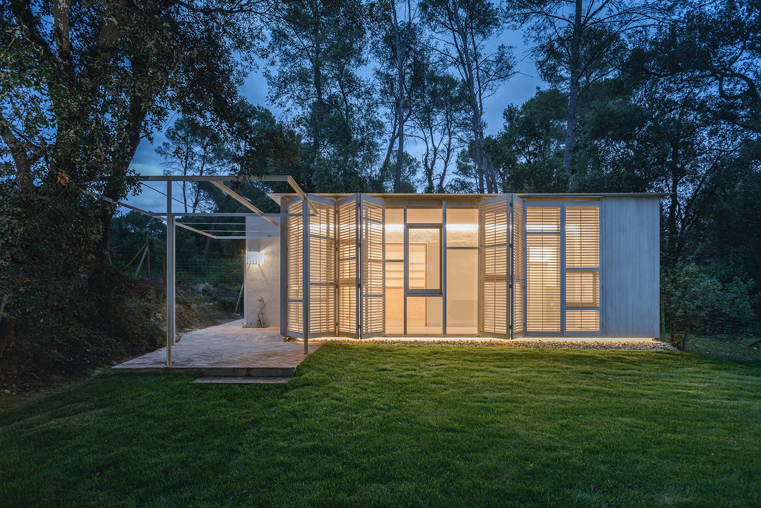 casa galeria tallerdarquitectura vista exterior nocturna