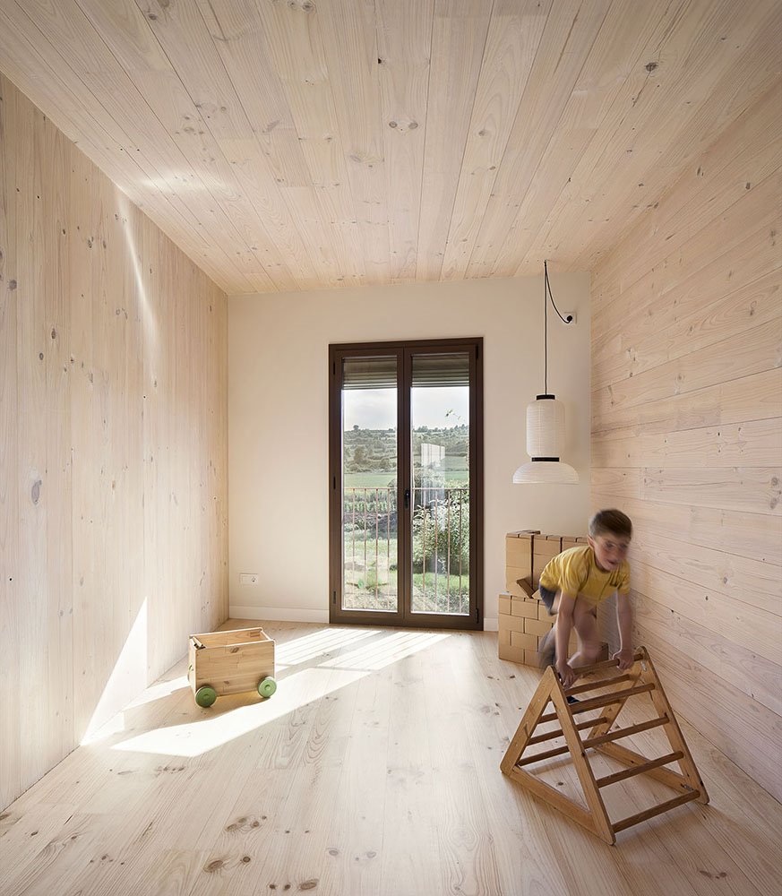 casa prefabricada mdn nook architects habitación infantil