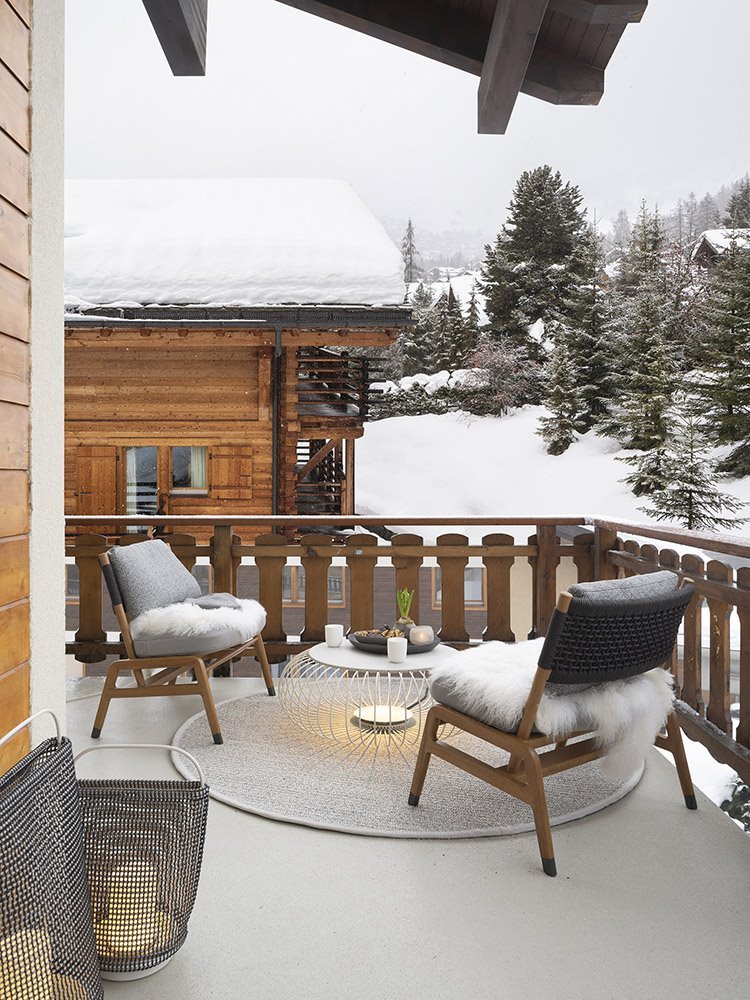 terraza casa madera en los alpes