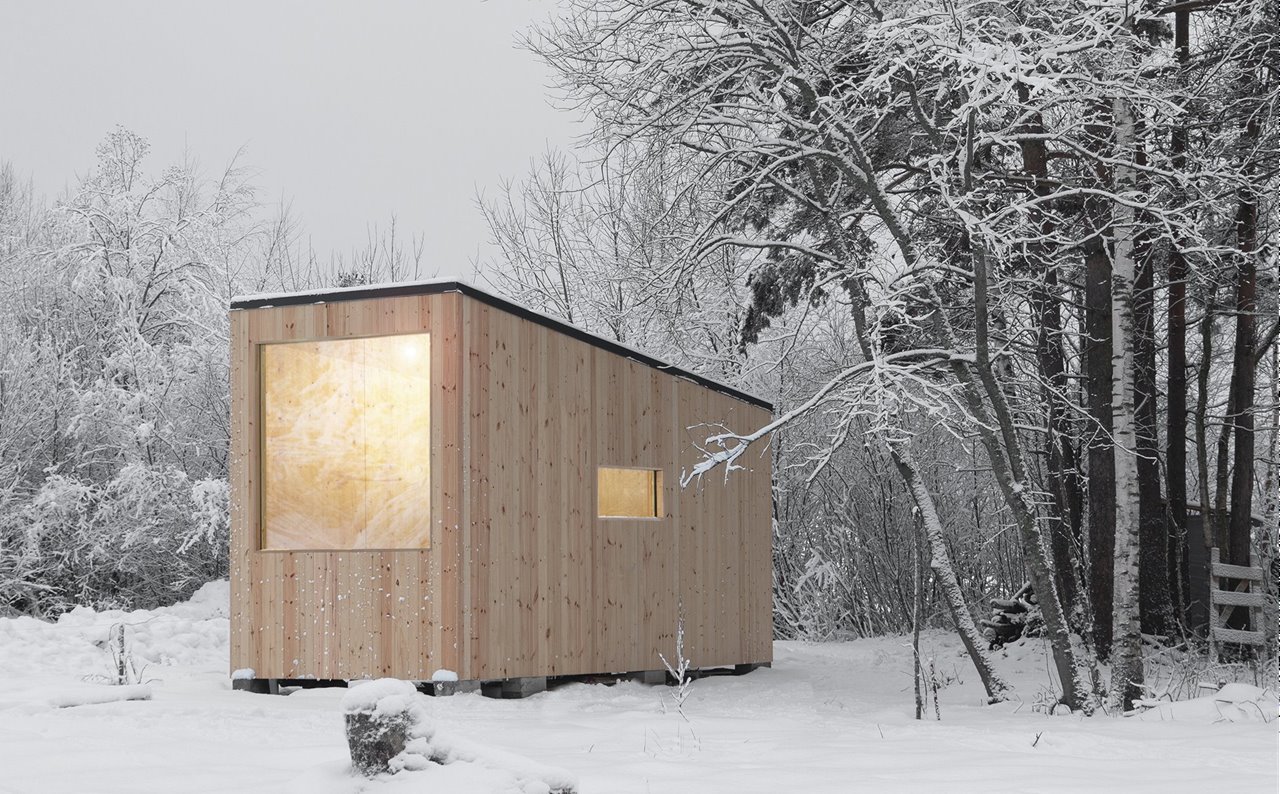 La mini cabaña cuenta con una pequeña cocina, un comedor, un armario, una cama con espacio de almacenamiento y un baño con ducha