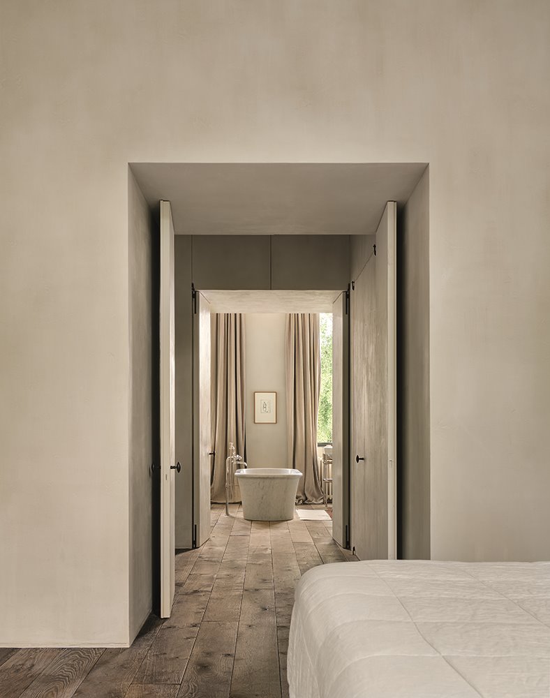 apartamento amberes vincent van duysen dormitorio a baño