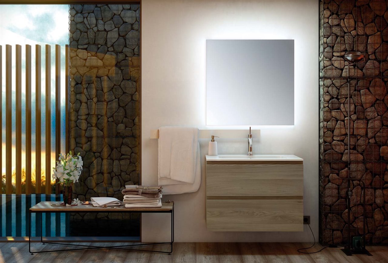 La iluminación Led evita que tengamos que instalar un aplique y, además, da una gran sensación de amplitud. Mobiliario de Unibaño.