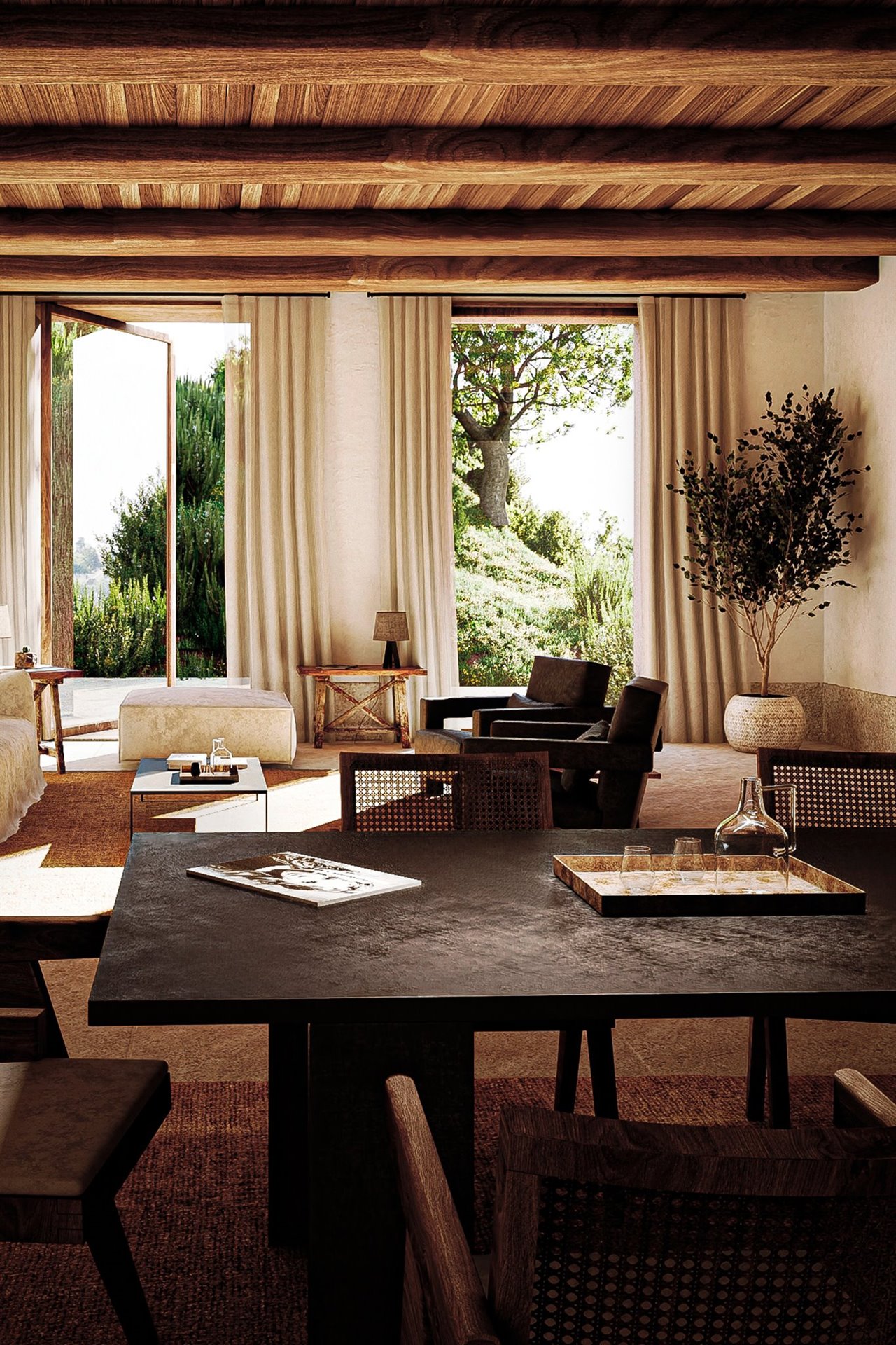 En esta estancia común de MRGO, los arquitectos han dividido el comedor y el salón utilizando alfombras a modo de separadores visuales, tal y como aconsejan desde Burondo.