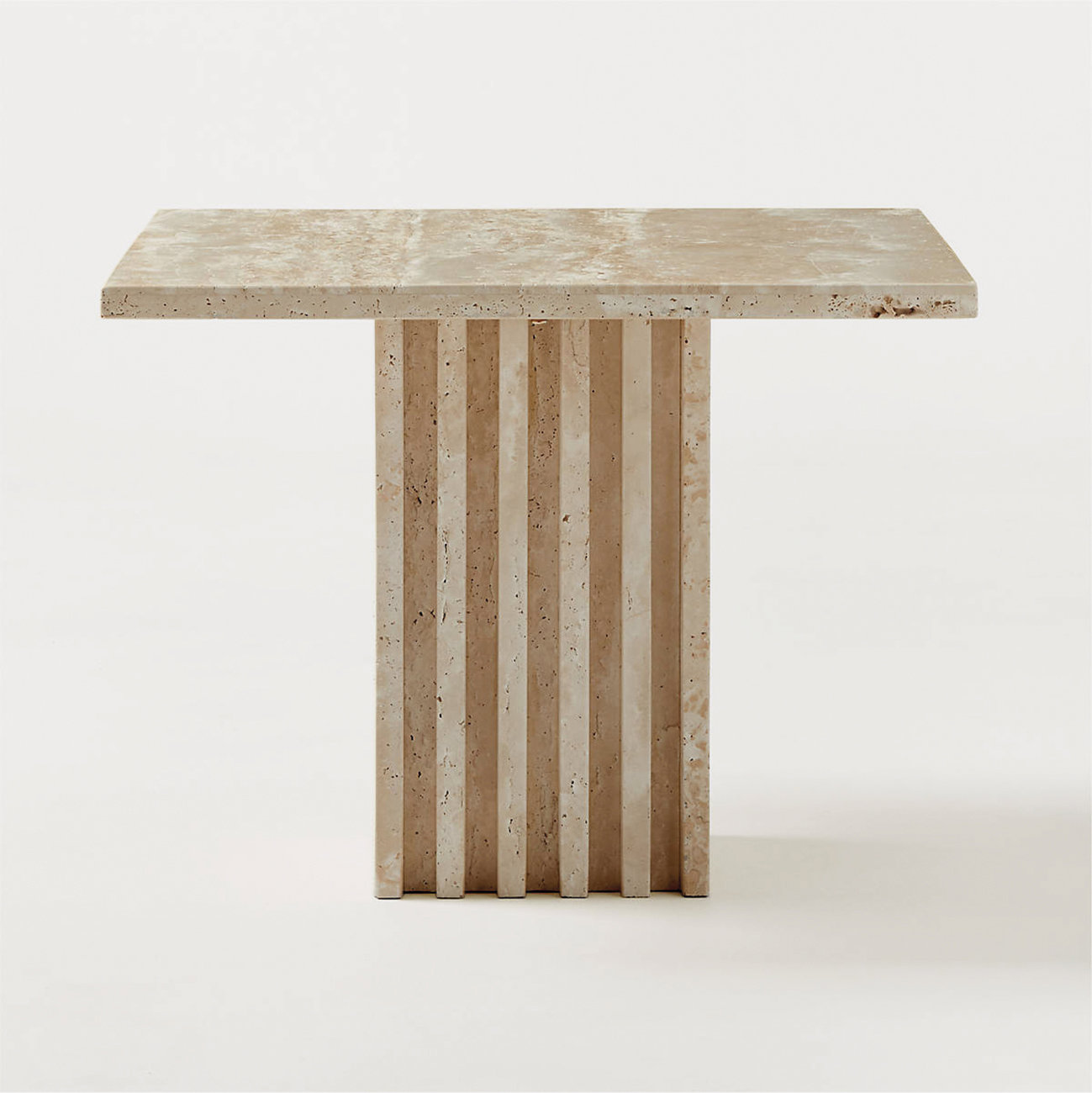 CB2 carve travertine large cocktail table